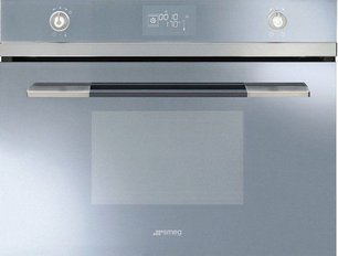 Компактный духовой шкаф с пароваркой Smeg SF4120VCS фото в Казани и Татарстане