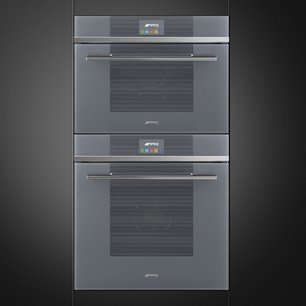 Компактный духовой шкаф с пароваркой Smeg SF4104VCS фото 4 в Казани и Татарстане