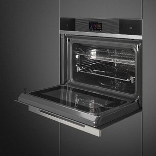 Компактный духовой шкаф с пароваркой Smeg SF4104WVCPN фото 4 в Казани и Татарстане