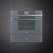 Компактный духовой шкаф с пароваркой Smeg SF4104VCS фото 2 в Казани и Татарстане