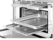 Компактный духовой шкаф с пароваркой Smeg SF4750VCBS фото 4 в Казани и Татарстане