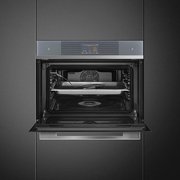 Компактный духовой шкаф с пароваркой Smeg SF4104WVCPS фото 4 в Казани и Татарстане