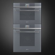 Компактный духовой шкаф с пароваркой Smeg SF4104VCS фото 4 в Казани и Татарстане