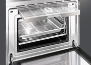 Компактный духовой шкаф с пароваркой Smeg SF4920VCX фото 3 в Казани и Татарстане