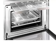 Компактный духовой шкаф с пароваркой Smeg SF4750VCBS фото 2 в Казани и Татарстане