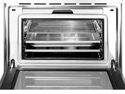 Компактный духовой шкаф с пароваркой Smeg SF4750VCBS фото 3 в Казани и Татарстане