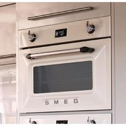 Компактный духовой шкаф с пароваркой Smeg SF4920VCP фото 2 в Казани и Татарстане