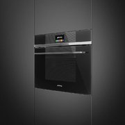 Компактный духовой шкаф с пароваркой Smeg SF4104VCN фото 2 в Казани и Татарстане